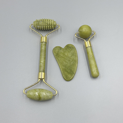 OEM / ODM Rose Quartz Jade Roller Face Stone Massager Set với dầu huyết thanh và Gunsha